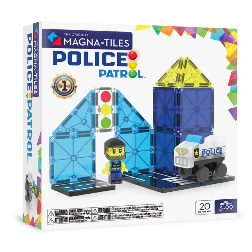 The Original Magna-Tiles Police Patrol toy set in its retail packaging, featuring blue translucent tiles, a police officer figure, a traffic light, and a police car on a white box with colorful accents.