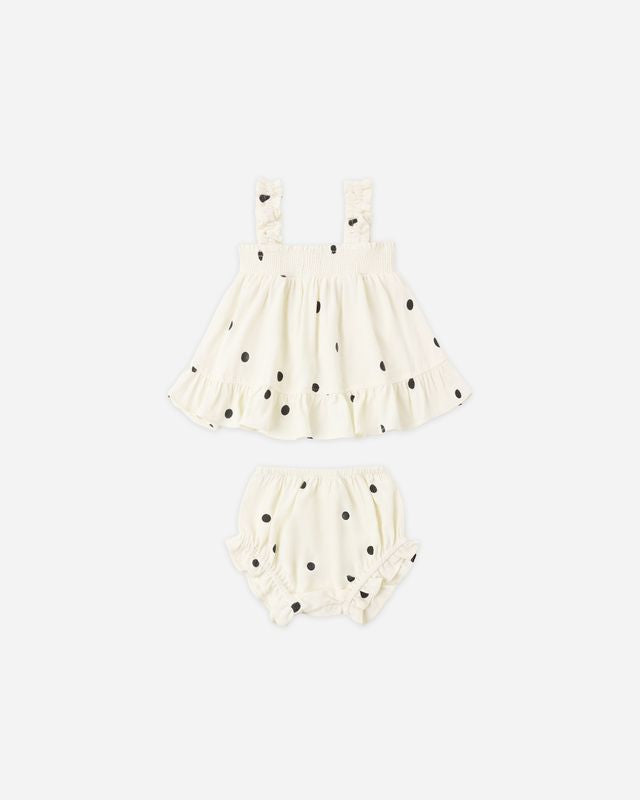 White polka dot dress with matching bloomers on a white background