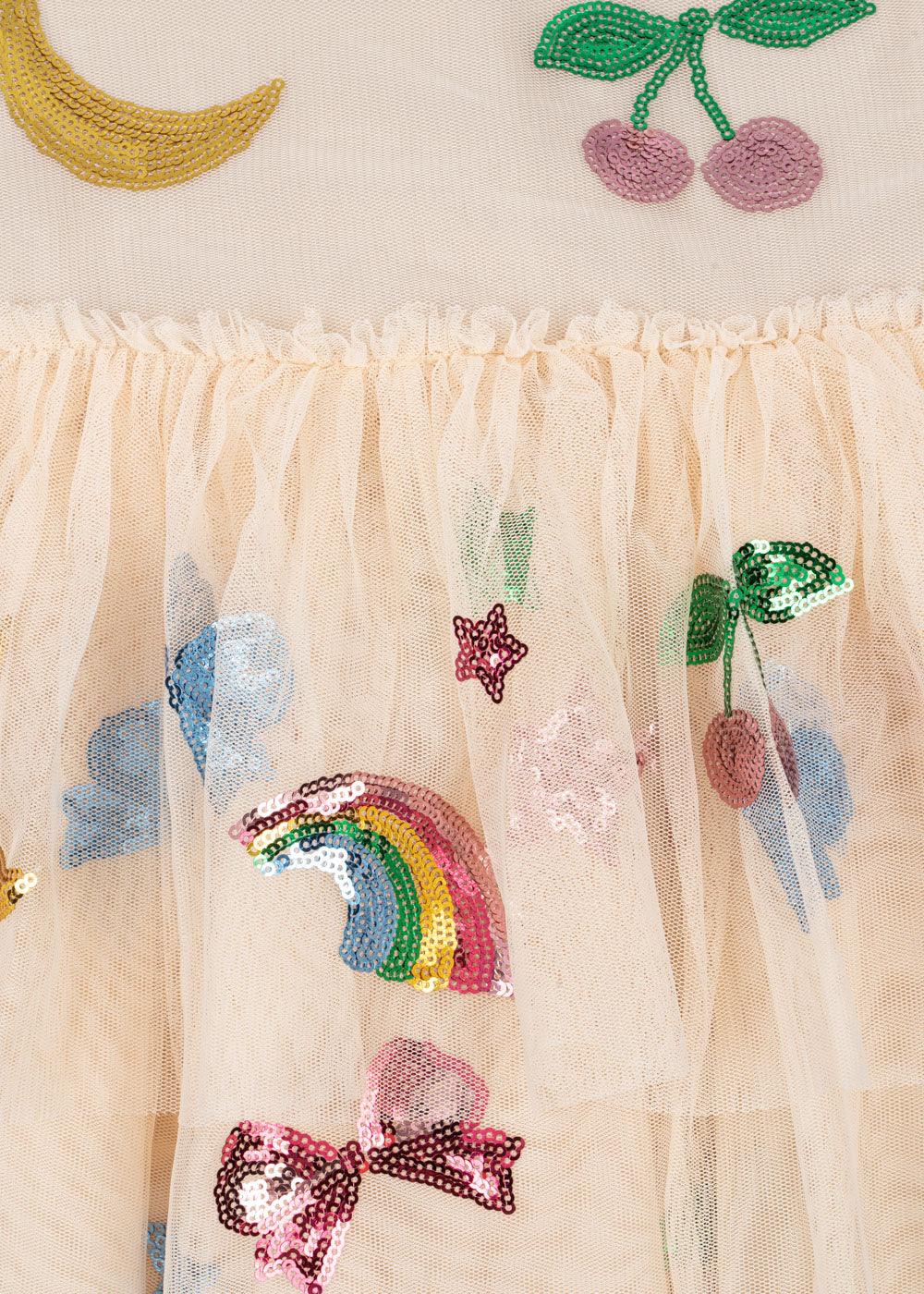 close up of the sequin appliques: cherries, rainbow, moon and bows. 