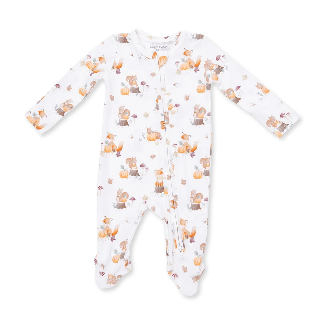 A white long-sleeve footed sleeper with a cute print of orange foxes, brown squirrels, and autumn leaves, shown flat on a white background.