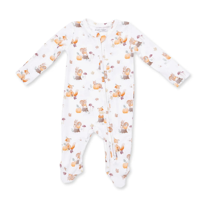 A white long-sleeve footed sleeper with a cute print of orange foxes, brown squirrels, and autumn leaves, shown flat on a white background.