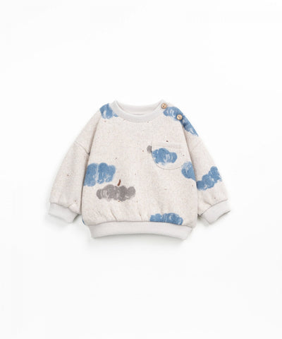 gray melange sweatshirt with blue and gray pumpkins all over it 