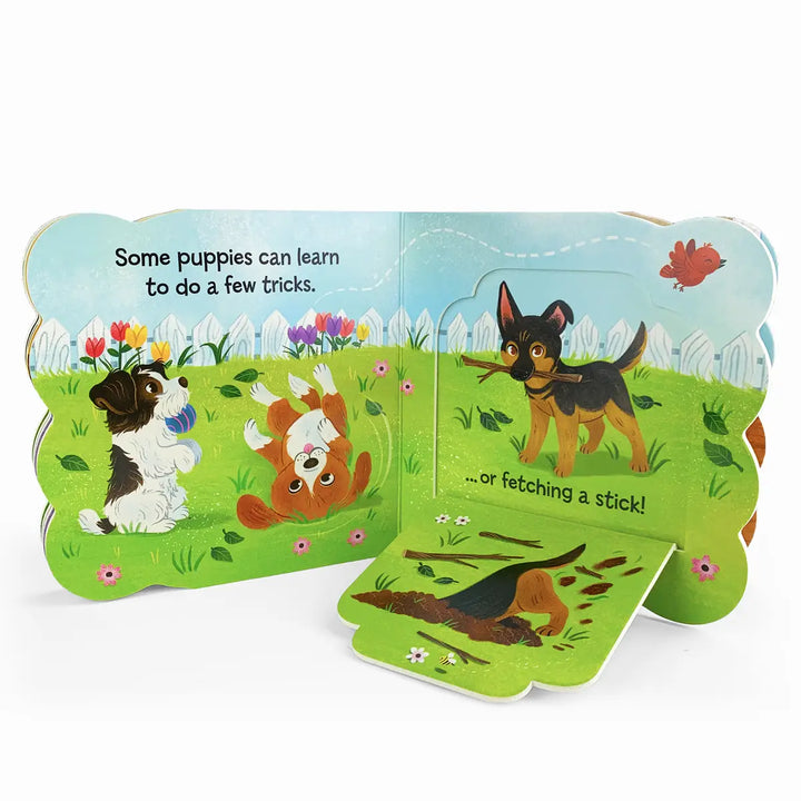 Children's book open to a page with illustrations of puppies and text about puppies learning tricks.