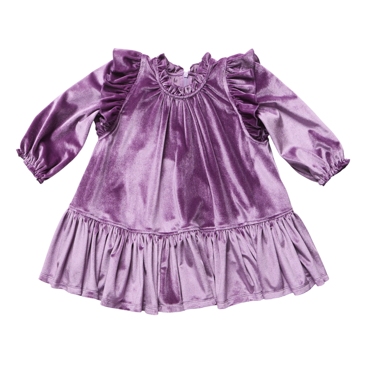 purple velvet dress with ruffle at the shoulder and ruffle at the bottom.