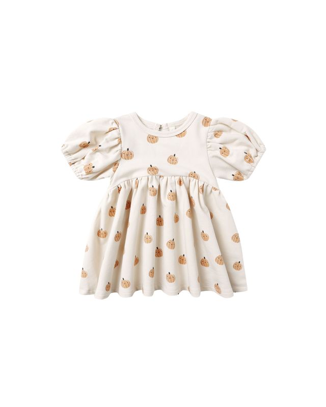 beige dress with pumpkin pattern on a white background