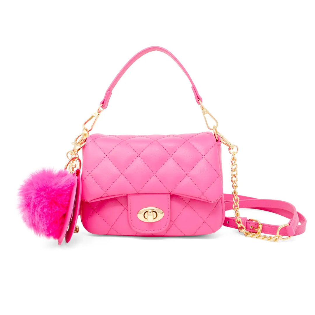 Pink quilted handbag with gold chain and pink pom-pom on a white background