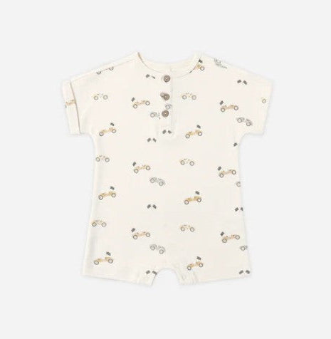 Baby romper with car pattern on a white background