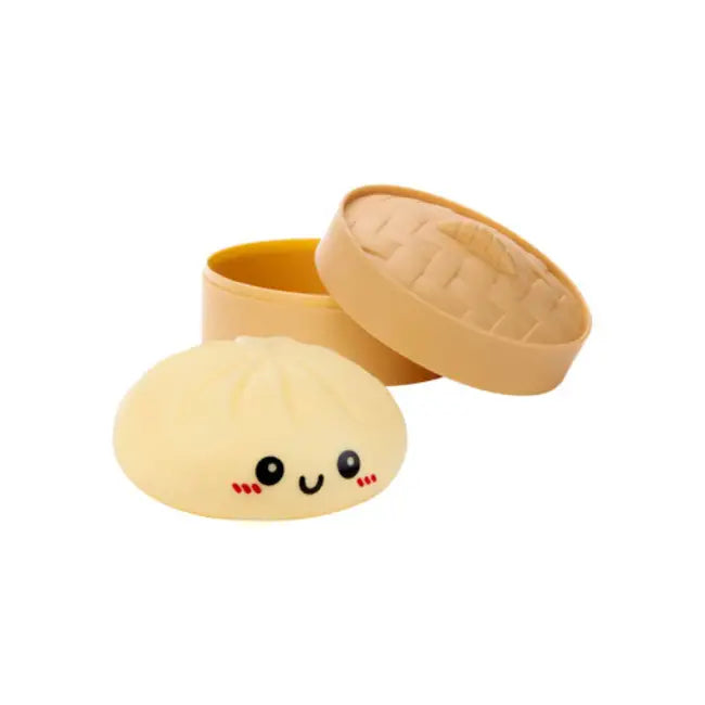 Stuffed toy shaped like a dim sum bun with a smiling face on a white background
