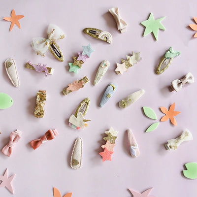 collection of all different clips from the unicorn collection. all pastel and golds