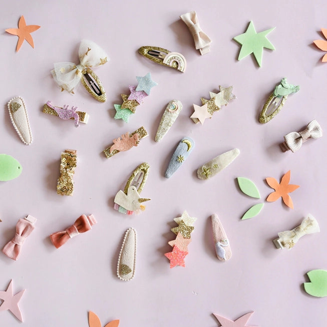 collection of all different clips from the unicorn collection. all pastel and golds