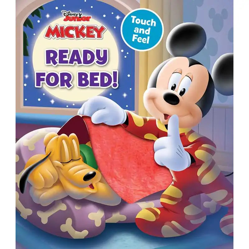 Disney Junior Mickey Ready for Bed! touch and feel board book cover featuring Mickey Mouse in a red and yellow patterned pajama suit waking up Pluto in bed under a red blanket.