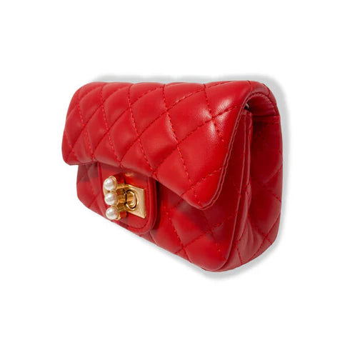 Red quilted handbag with a gold clasp on a white background