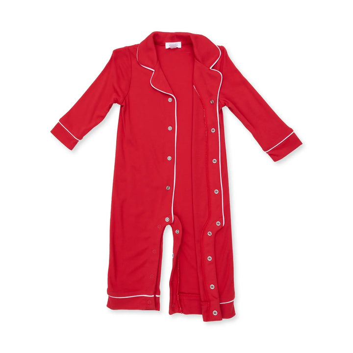 Red pajama set with white piping on a white background
