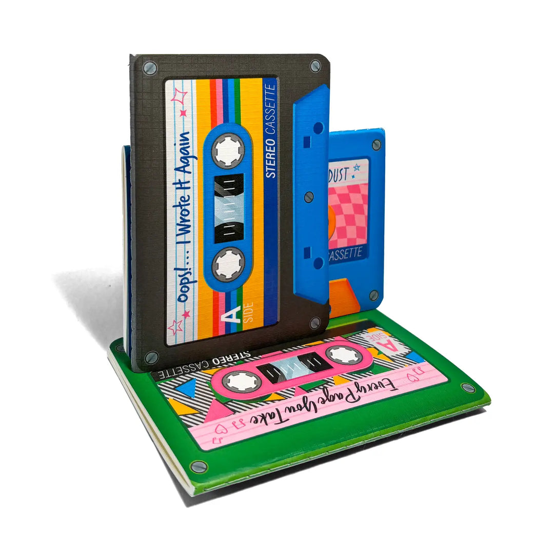 A novelty cassette tape book stand featuring retro cassette tape illustrations on its pages and spine, shown open on a white background.