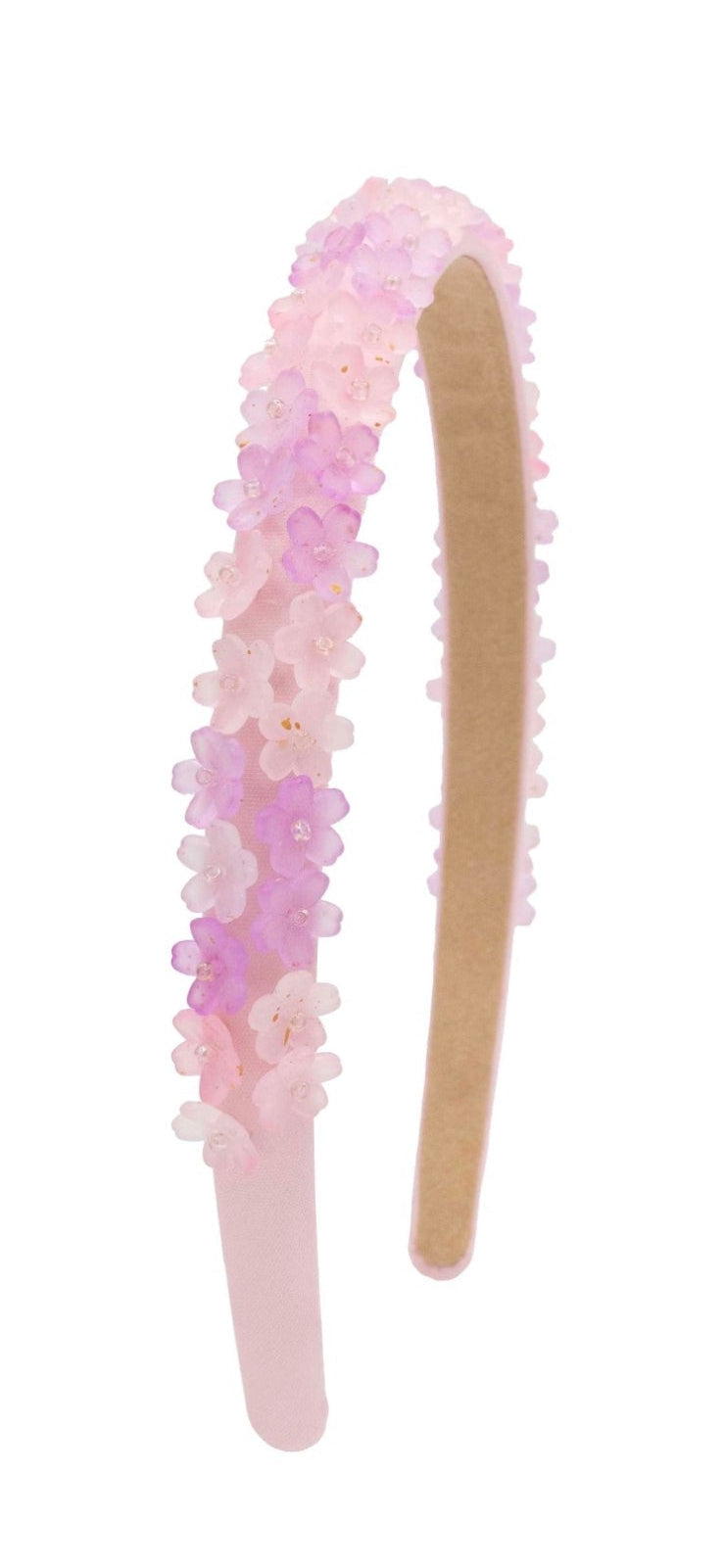 pink headband with rows of tiny pink and lavender flowers 