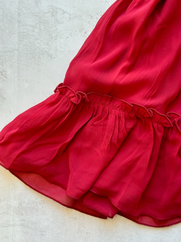 Red fabric with a textured surface on a light background