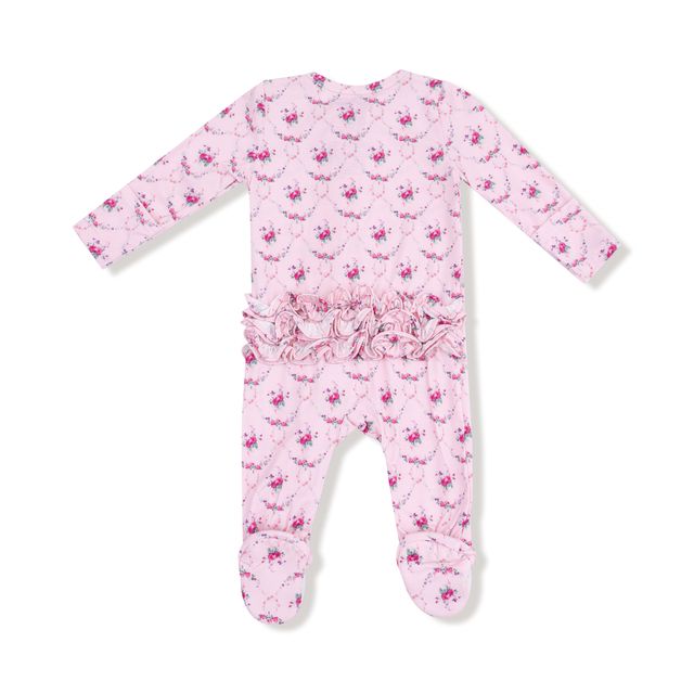 Pink baby onesie with floral pattern and ruffles on the bum on a white background