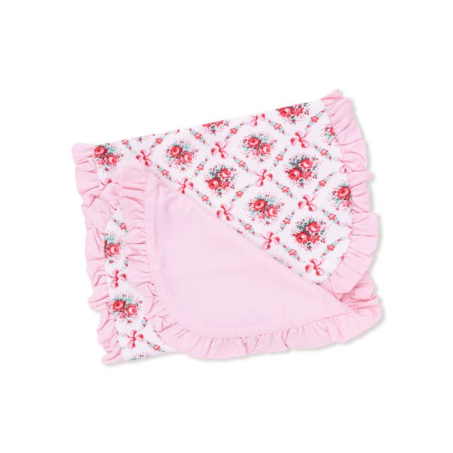 Pink baby burp cloth with floral pattern on a white background