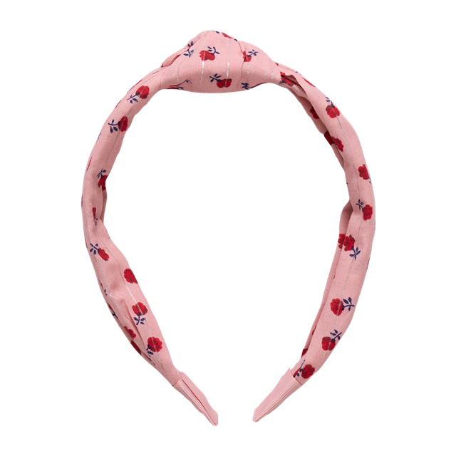 Pink headband with floral pattern on a white background
