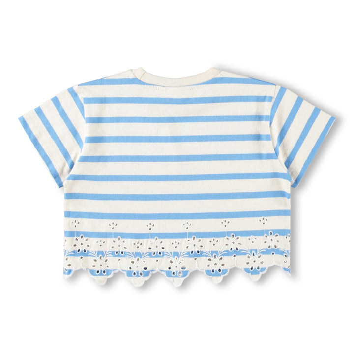 Blue and white striped shirt with scalloped hem on a white background