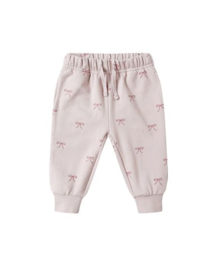 Pink baby pants with bow pattern on a white background