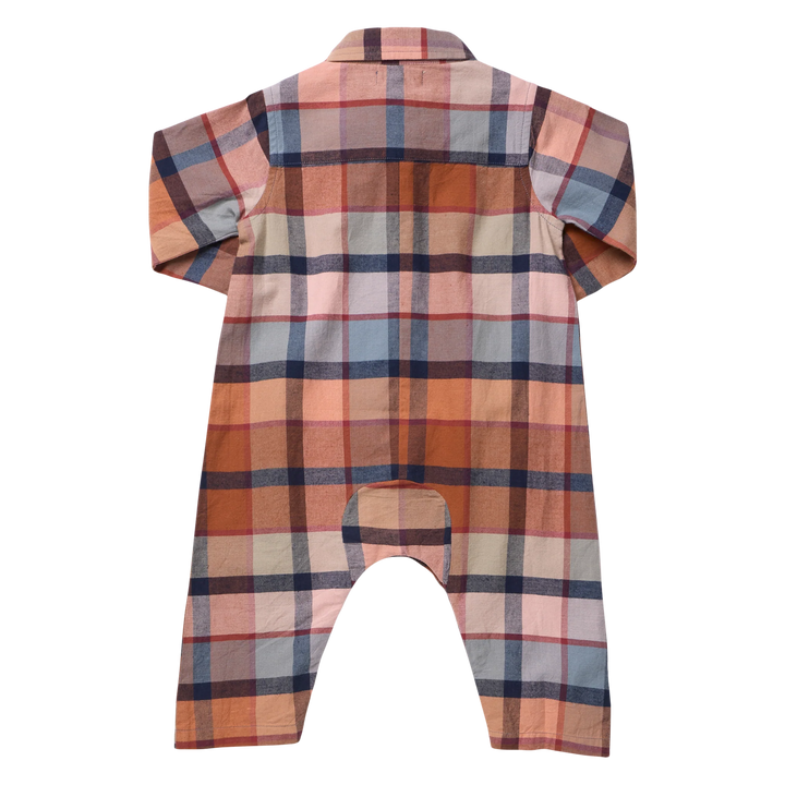 back of baby jumpsuit in a rust plaid 
