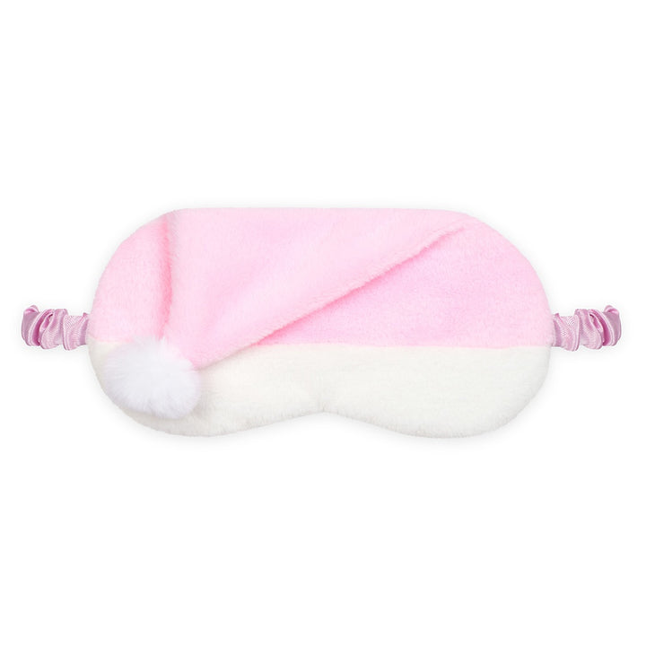 A plush sleep mask designed like a Santa hat, featuring a soft pink top half with a white pom-pom and a white bottom half, with pink elastic straps on either side, shown against a plain white background.