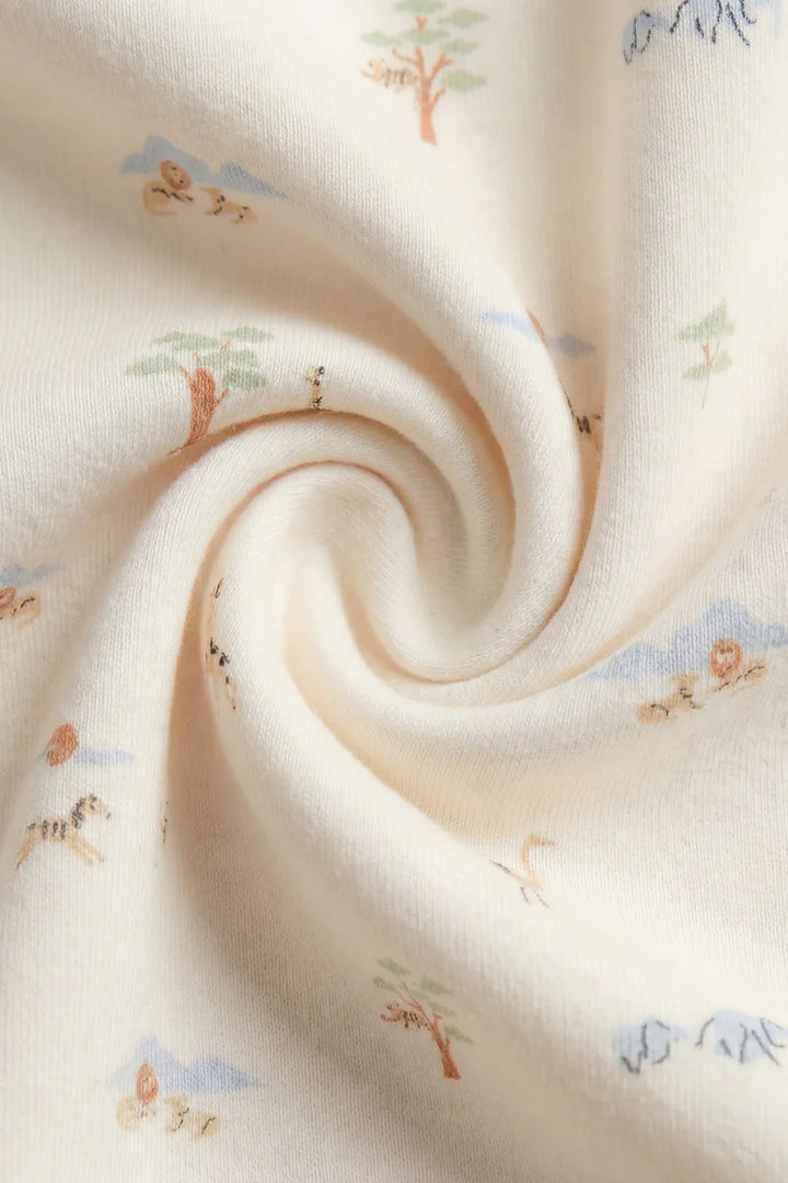 Close-up of soft fabric with small tree and animal prints