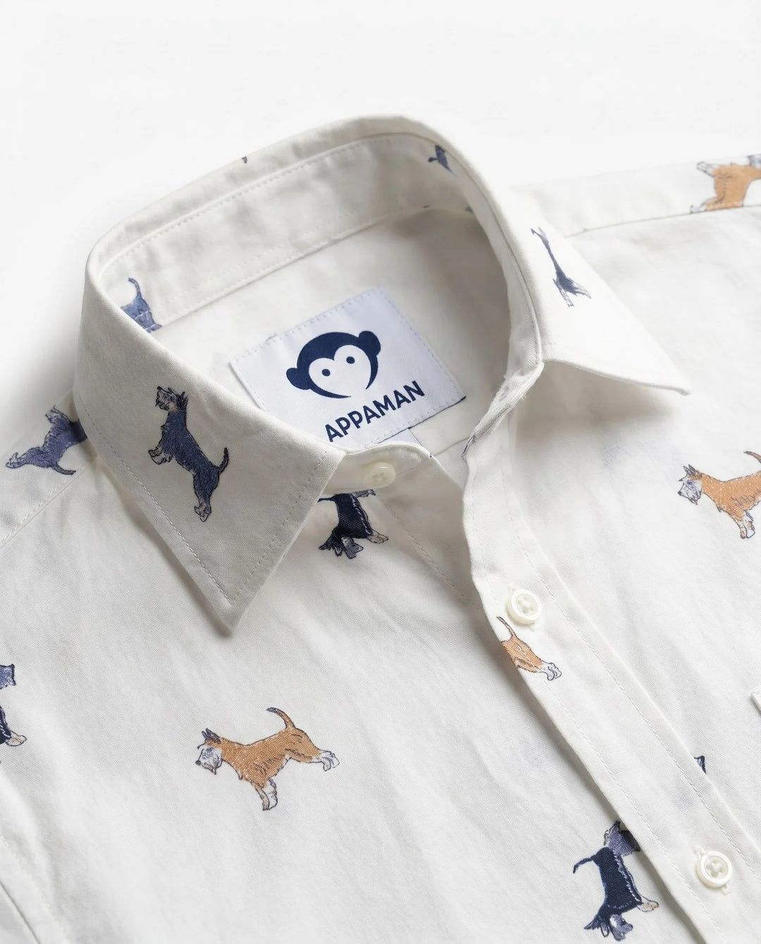 white button down shirt with scotty dogs on all over. 