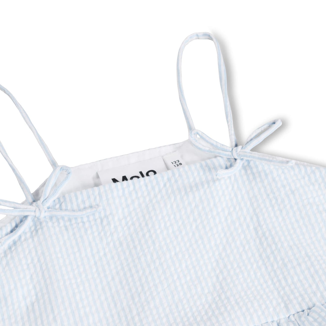 Light blue and white striped dress with thin straps on a white background