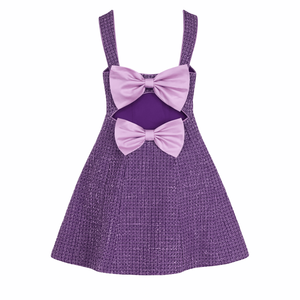back of the purple tweed dress with big purple sating bows across the back. 
