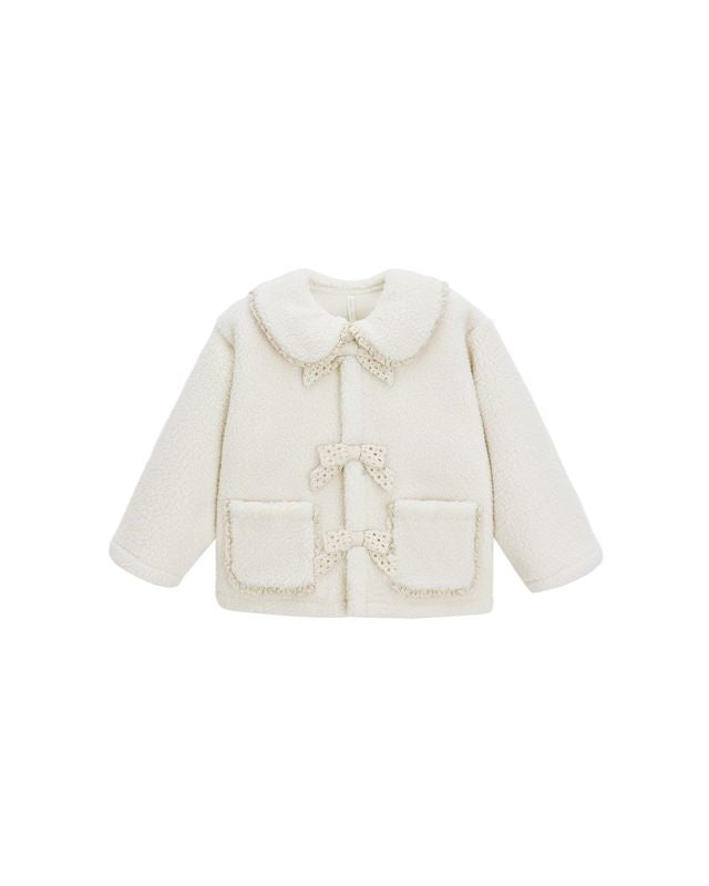 White children's coat with decorative elements on a white background