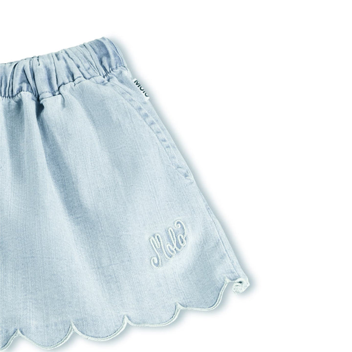 Light blue denim shorts with scalloped edge and 'Hello' embroidery on a white background