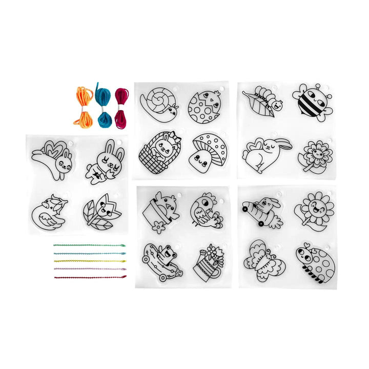 this picture shows you the different charms/outlines before they are colored in and shrunk. 