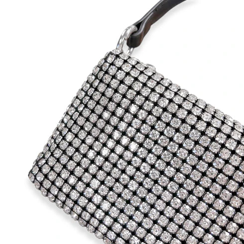Sparkling clutch bag with rhinestone embellishments on a white background