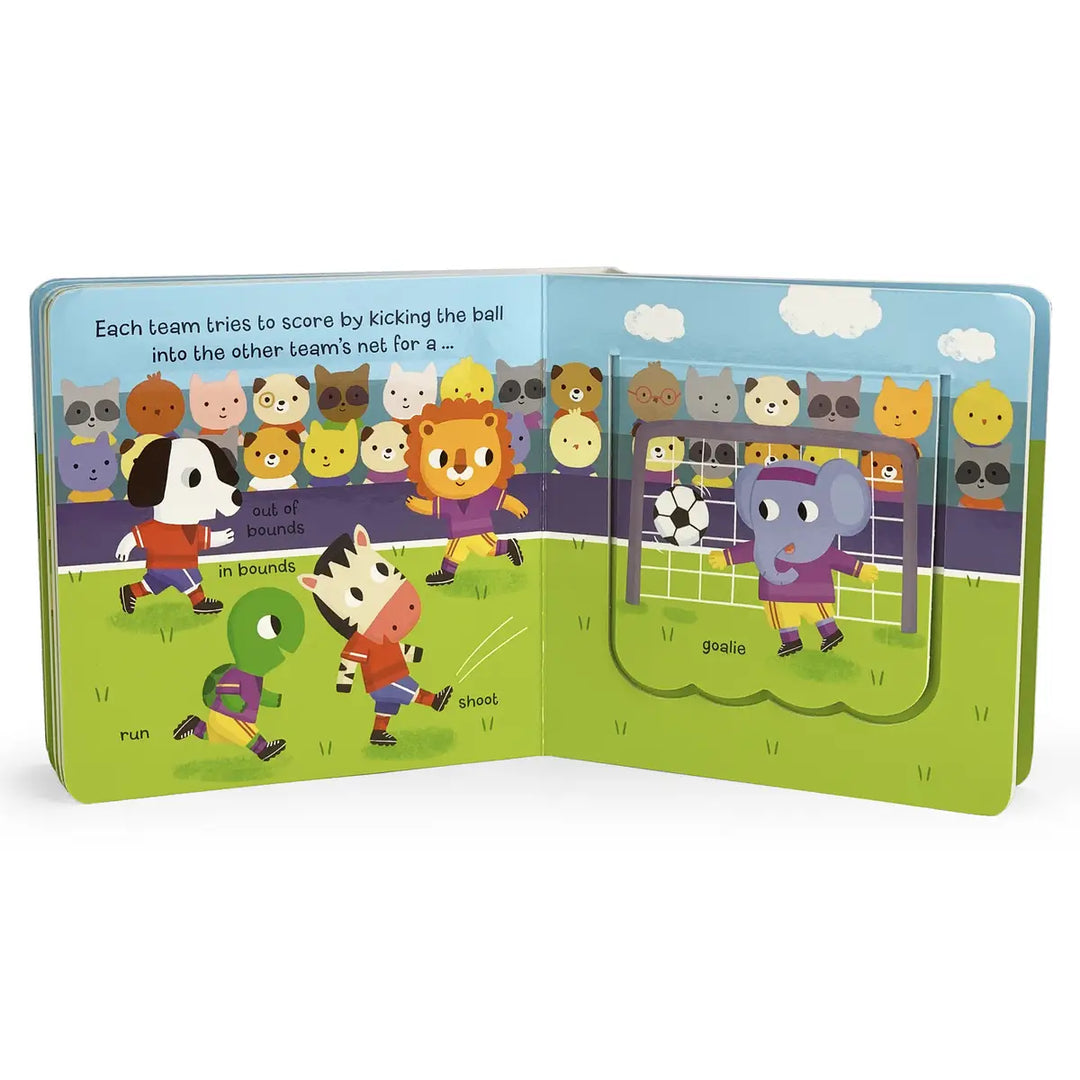 Children's book open to a page with cartoon animals playing soccer