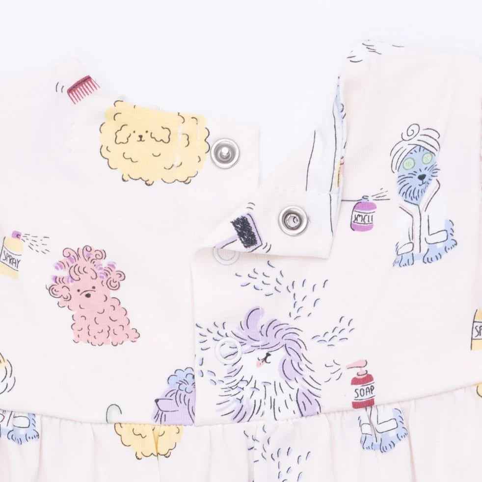 Colorful illustrations  on a baby romper of animals and spa objects on a white background
