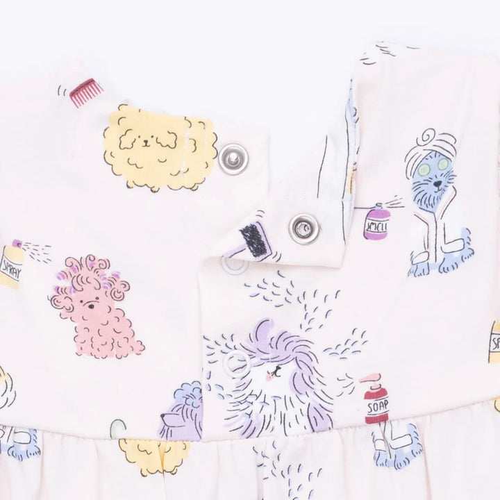 Colorful illustrations  on a baby romper of animals and spa objects on a white background