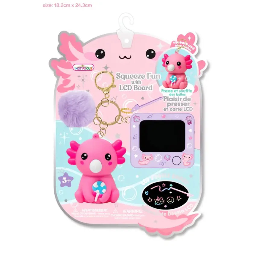A pink and light purple retail package containing a small toy screen device labeled 'Squeeze Fun with LCD Board,' a pink axolotl-shaped keychain, a purple pom-pom, and printed product graphics on a white background.