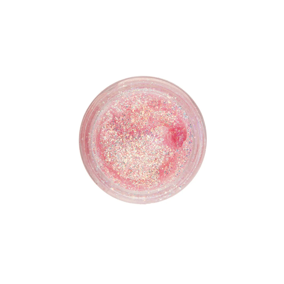 Pink glitter in a small round container on a white background