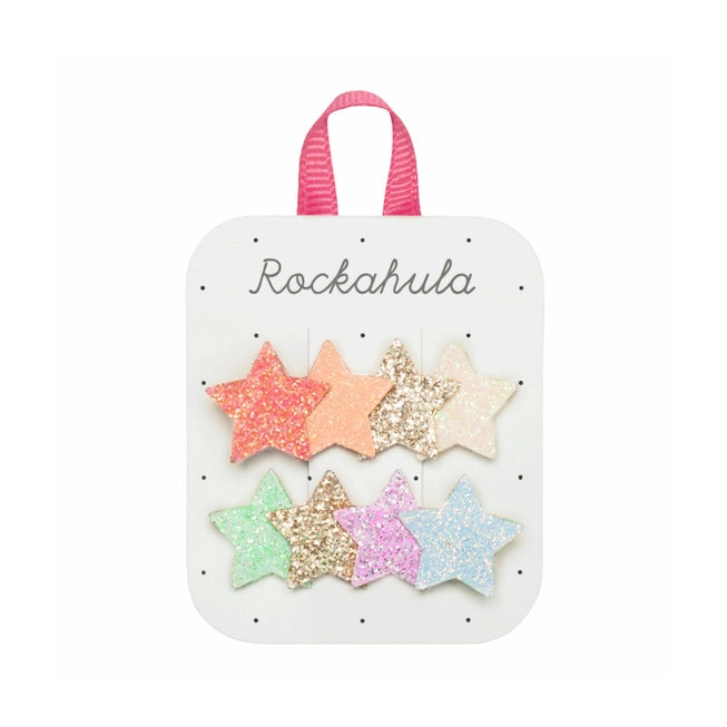 set of 2 clips each with 4 cutout stars. stars are all glittery and come in a rainbow assortment of colors. 