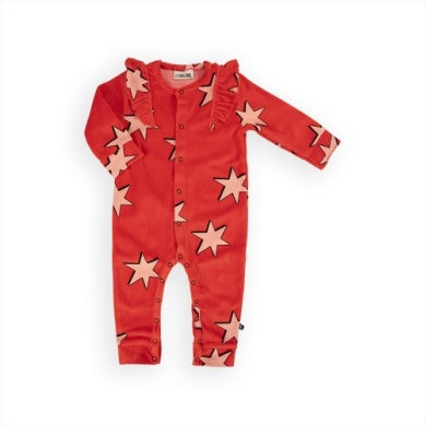 red velvet baby jumpsuit with ruffles on the shoulders. light pink stars print all over. 