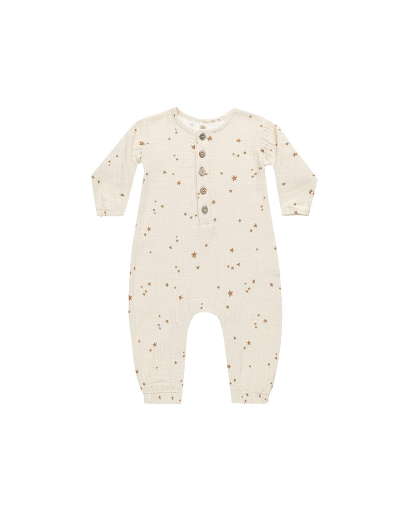 baby woven jumpsuit. beige in color with all over star print. 