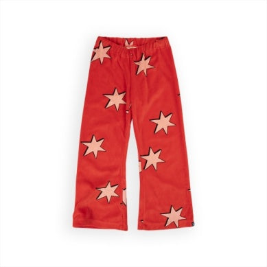 flared pants, red velvet with light pink stars all over. 