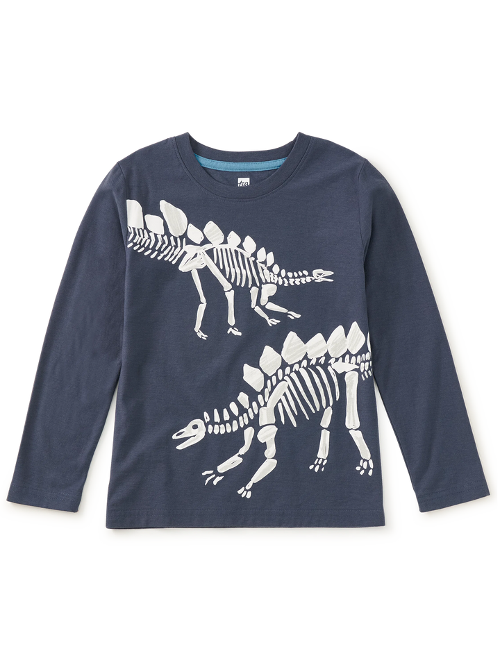 A navy blue long-sleeve crewneck shirt for kids, featuring a white skeleton print of two dinosaurs on the front, displayed flat against a white background.