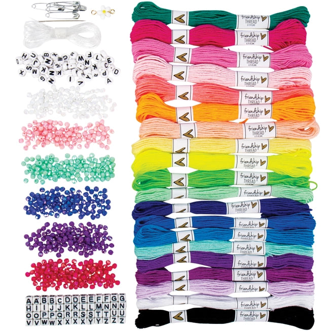 close up of the supplies included in the kit. thread in every color imaginable and 6 different color beads and beads with letters on them. 