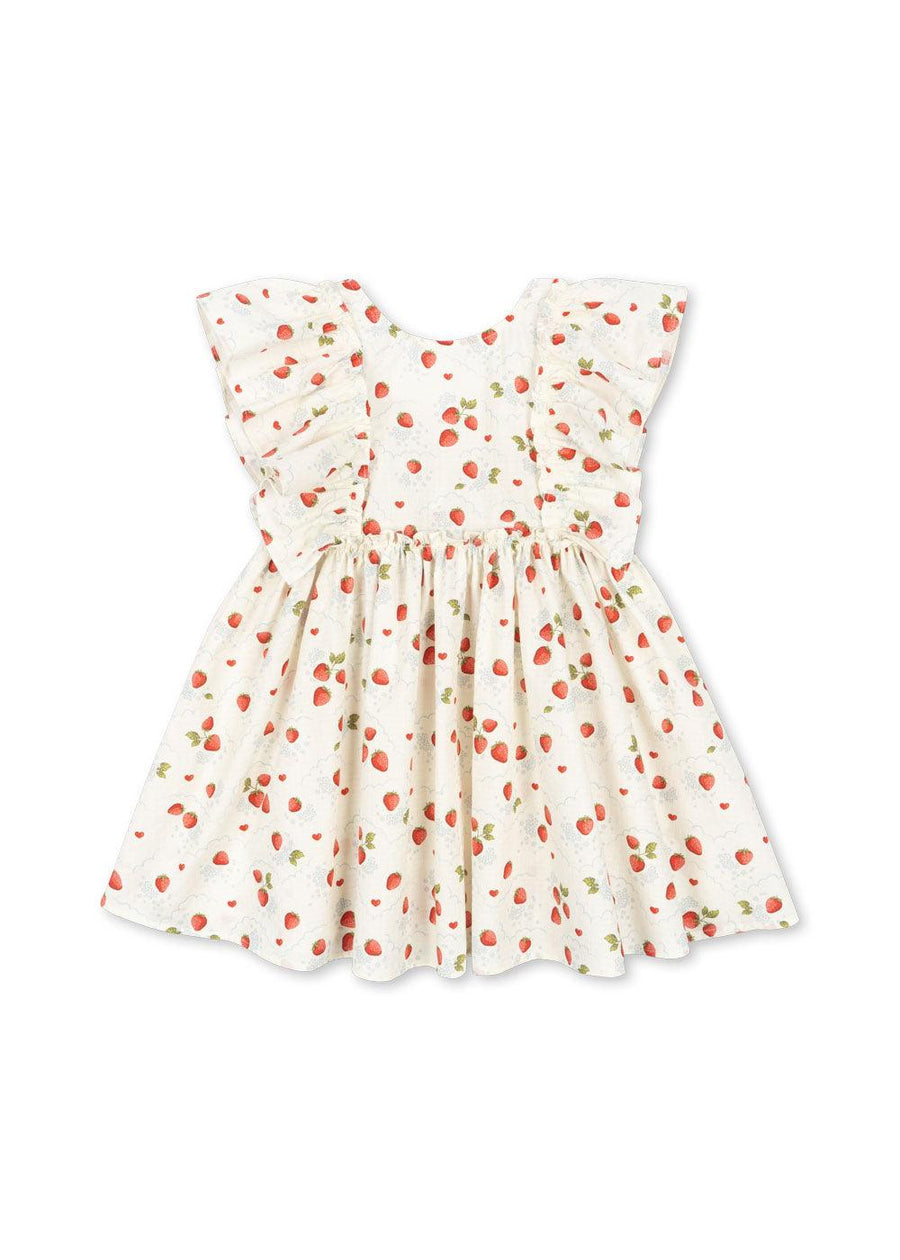 beige dress sleeveless with two big ruffles at the side of the dress. tiny red strawberries all over the dress. 