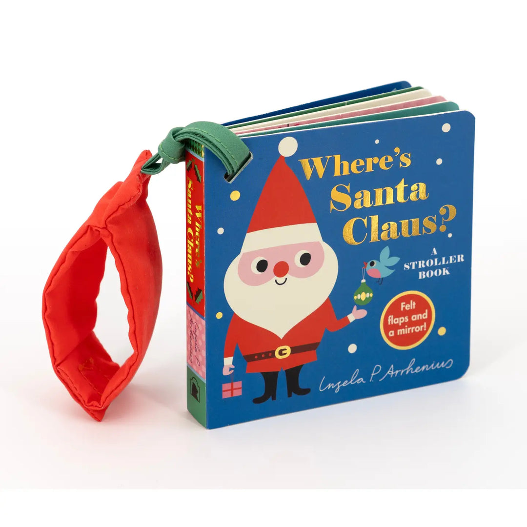 A children's stroller book titled "Where's Santa Claus?" with a blue cover featuring a Santa Claus illustration, a green strap, and a red fabric loop handle, photographed on a clean white background.
