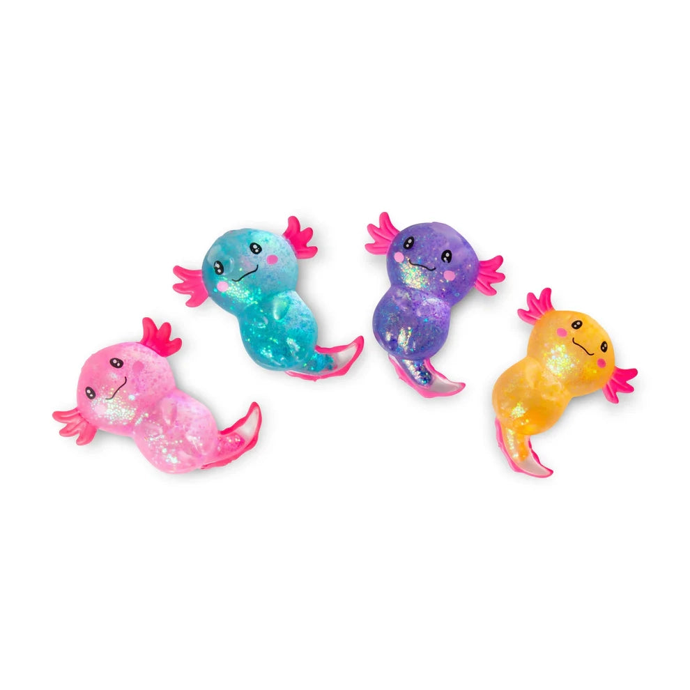 Four colorful axolotl squish toys on a white background