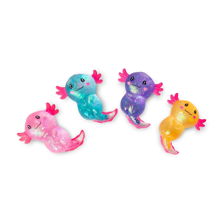 Four colorful axolotl squish toys on a white background